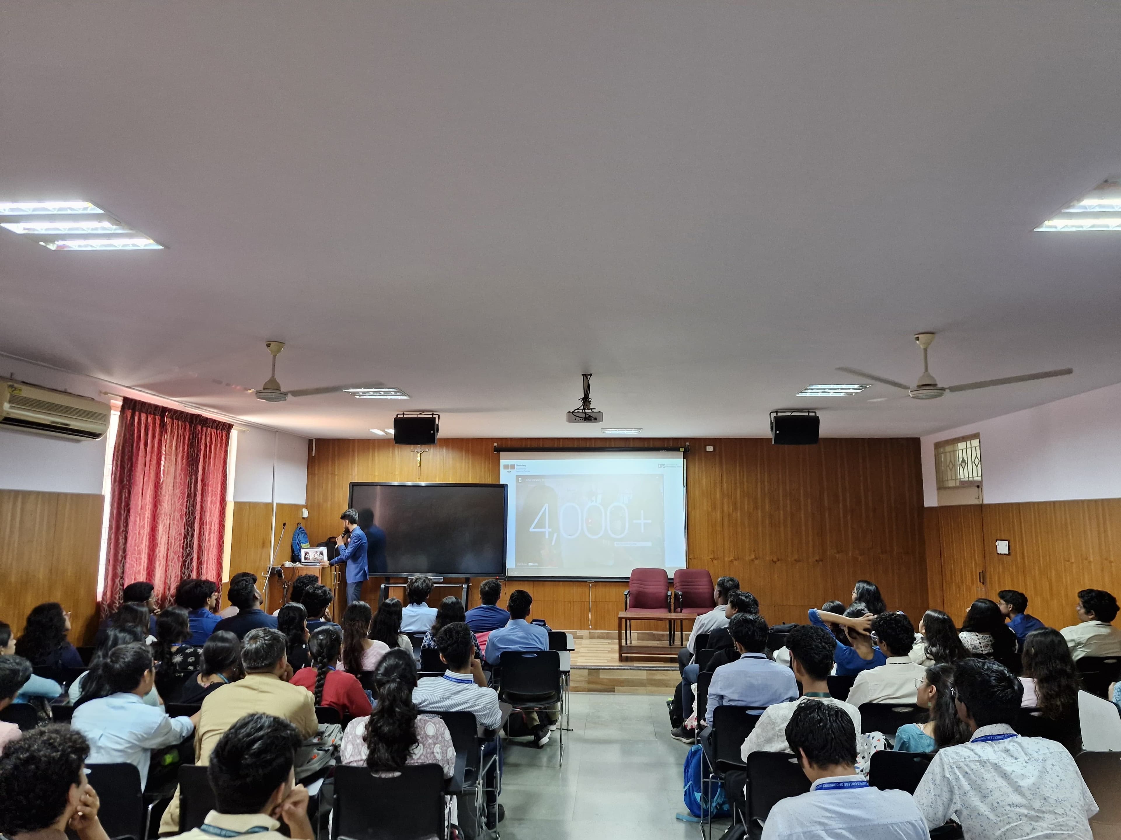 Students learning by doing in a Bloomberg workshop